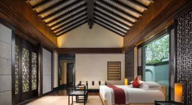 Кровать в общем номере Yurun Hanyuelou Villa Resort