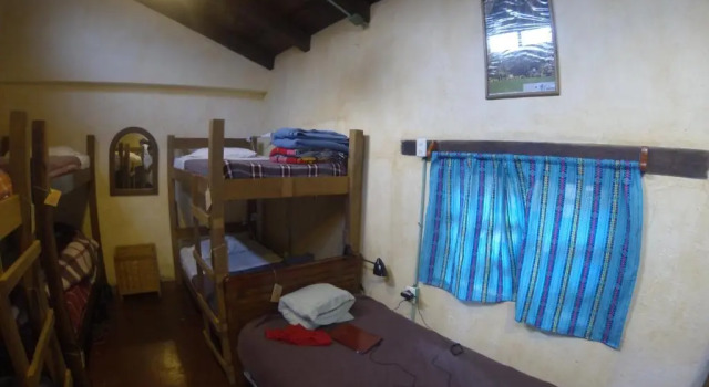 Кровать в общем номере Posada del Abuelito