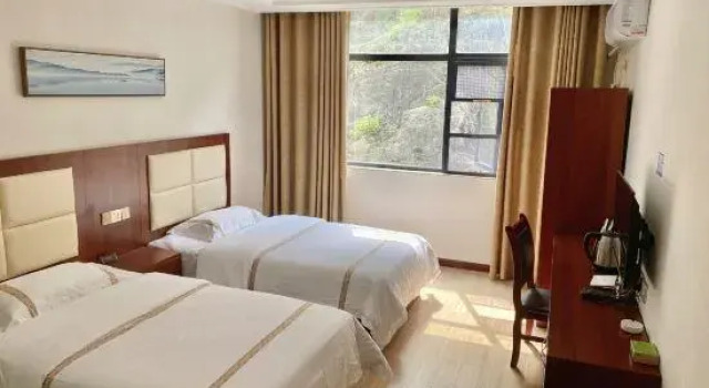 Hefeng Manshanhong Homestay, Prenota Hotel Enshi Prefecture Cina
