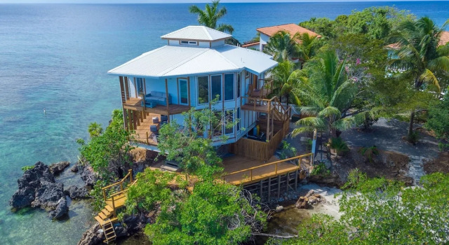 Коттедж Awesome Over The Water Overlooking West End - Aire Agua 3 Bedroom Home by RedAwning