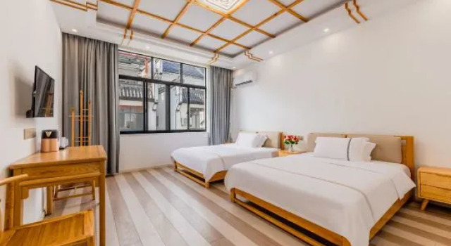 Кровать в общем номере Zeyuan Homestay