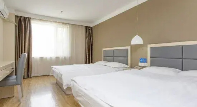 Кровать в общем номере Shenyang Fuqiang Kangle Express Hotel