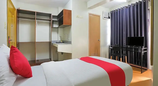 Номер Deluxe Anglo Residences Manila