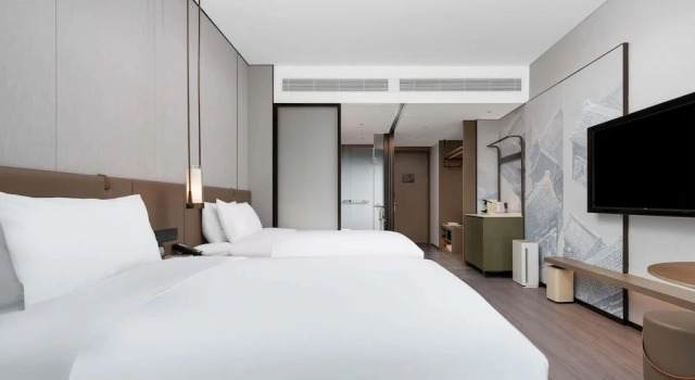 Четырёхместный номер Classic Grand Mercure Changzhou Luoxi