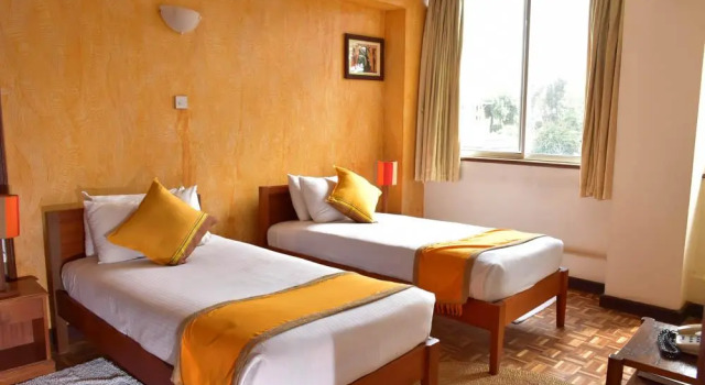 Номер Standard Мансарда Kenya Comfort Suites