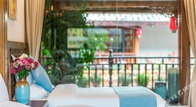 Huayuetang Inn, Забронировать Отель Отели Лицзян 3 звезды, рядом с Улица Сквер-стрит Древнего города Даянь, 3*