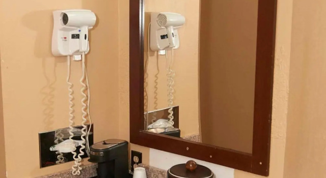 Четырёхместный номер Standard New World Inn