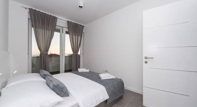 Апартаменты Deluxe с 2 комнатами с балконом и с видом на море Villa Magnifica apartments with pool
