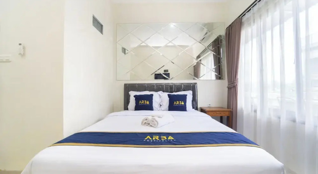 Camera Deluxe Dominic Inn Semarang By ARBA