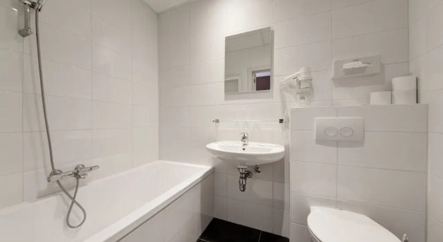 Трёхместный семейный номер Standard Hotel Du Commerce