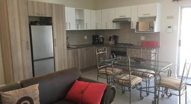 Коттедж с 2 комнатами African Palm Cottage and Guesthouse