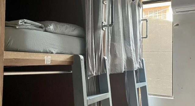 Кровать в общем номере Casa Wolaba
