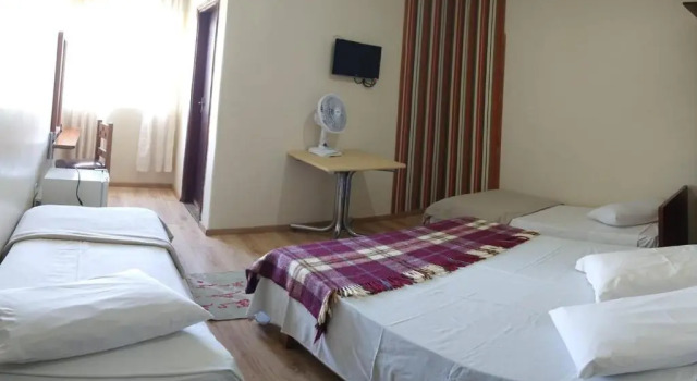 Четырёхместный номер Standard Icarai Palace Hotel e Pousada