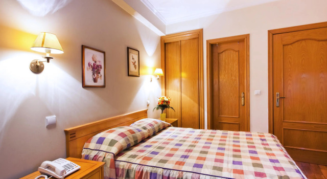 Кровать в общем номере Residencial Colombo