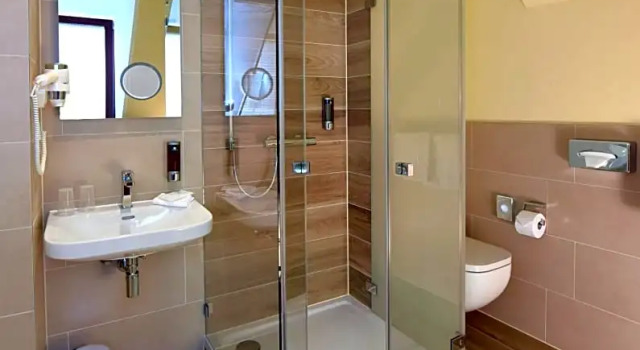 Апартаменты Port Inn Hotel