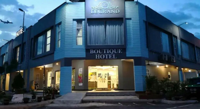 Кровать в общем номере De Grand Boutique Hotel
