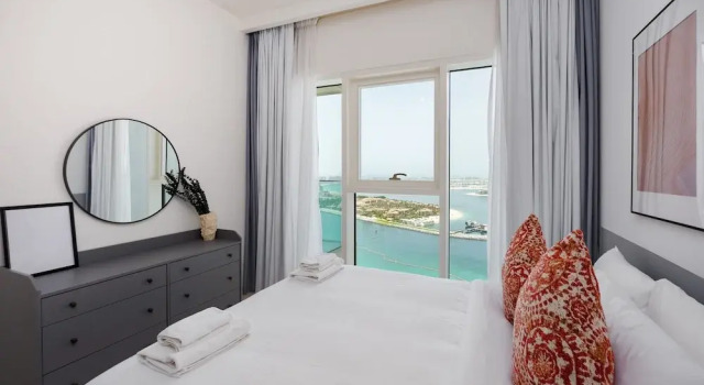 Апартаменты Elegant 2BR Emaar Beachfront Retreat