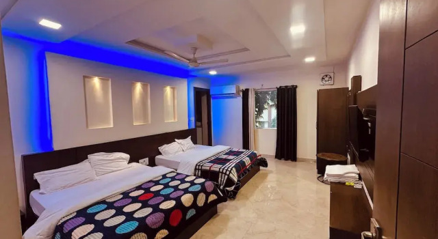 Кровать в общем номере Taj Castle Homestay