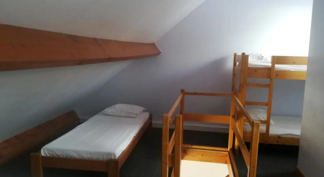 Кровать в общем номере Hotel Aquatel