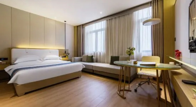Люкс Deluxe Tianguo Light Luxury Apartment Hotel (Foshan Dali Linli Square)