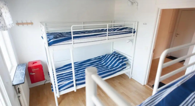 Кровать в общем номере Lagunen Cottages and Hostel