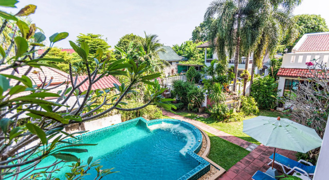 Кровать в общем номере Phuket Monaburi Boutique Hotel