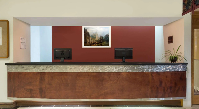 Кровать в общем номере Budget Inn Laramie