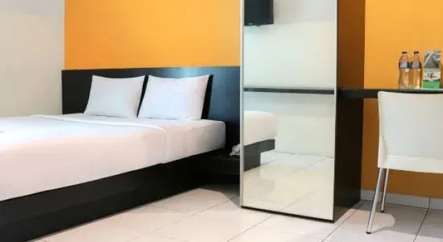 Номер Standard LeGreen Suite Ratulangi