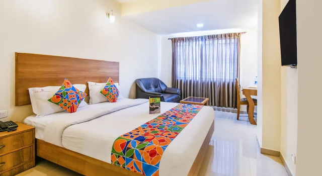 Номер Deluxe FabHotel Jansi Deluxe - Nr Gandhipuram Bus stand
