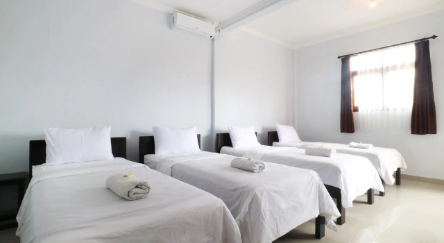 Четырёхместный номер The Wina Echo Beach Guest House