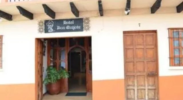 Кровать в общем номере Hotel Don Quijote
