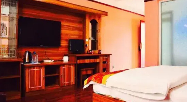 Люкс Deluxe Yulong Changzheng Business Hotel