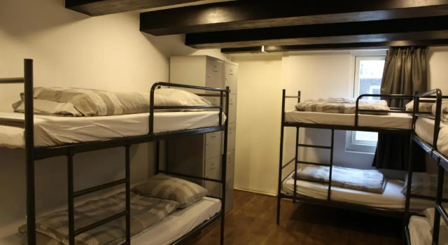 Кровать в общем номере Amsterdam Downtown Hotel Canal View