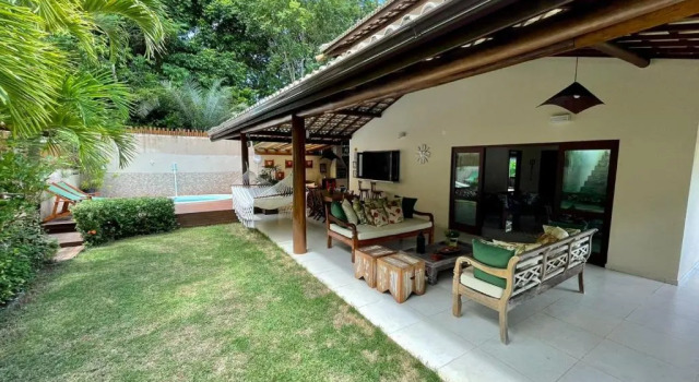 Коттедж с 4 комнатами Praia do Forte com Reserva Sapiranga casa com 4/4.