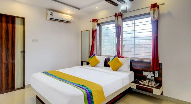 Номер Deluxe Treebo Trip Hotel Guru Krupa