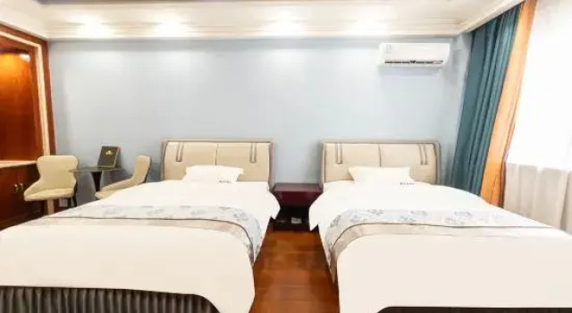 Suite Kuqa Xinyu Hotel (Guiz Plaza)
