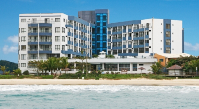 Кровать в общем номере Ingleses Praia Hotel