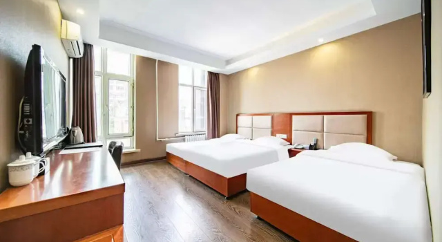 Трёхместный номер Deluxe Huaxi Hotel