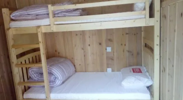 Кровать в общем номере Songpan Yi Xin Yuan Hostel