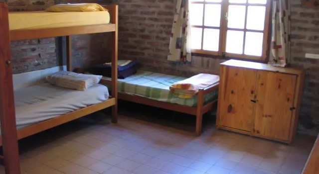 Puma Hostel, Забронировать Хостел Хостелы Сан-Мартин-де-лос-Андес, рядом с Горнолыжный курорт San Martin de Los Andes, Хостел