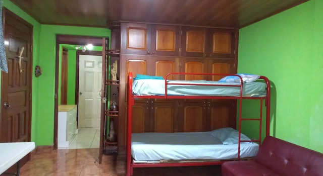 Кровать в общем номере Casa Montoco