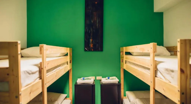 Кровать в общем номере So Art Guesthouse 旅人藝棧民宿