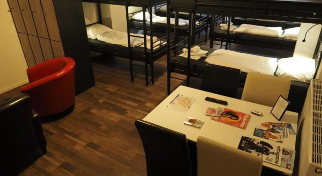 Кровать в общем номере Hotel t Anker