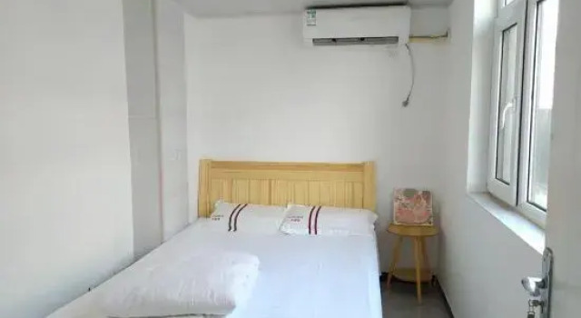 Номер Economy Mengzi Xingda Hotel (Honghe Stadium Honghe Prefecture Government Branch)