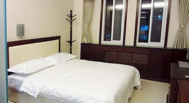 Qingdao Mengsaiwang Hotel, Забронировать Отель Хуандао 