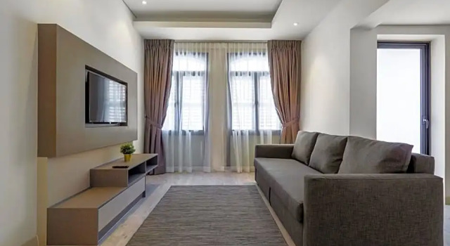 Люкс с балконом Macallum Central Hotel Managed by The Ascott Limited