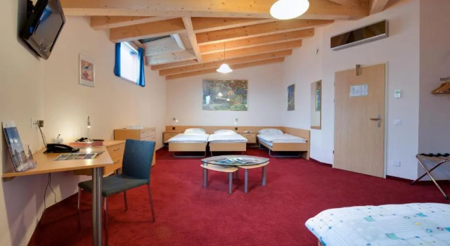 Четырёхместный номер Standard Мансарда Hotel La Perla