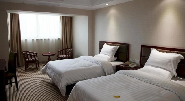 Huanyu Chain Hotel, Prenota Hotel Hotel a Wuxi con parcheggio, Parcheggio
