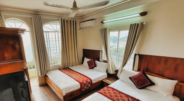 Номер Deluxe HKD Nhà nghỉ Quang Vinh 2 - QV2 Guesthouse