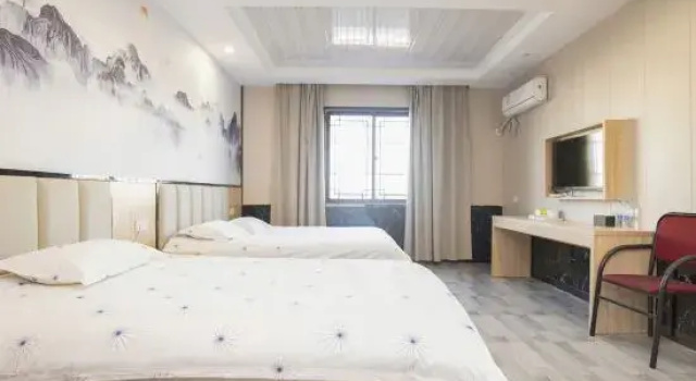 Qingmu Hotel (Hexian Xiaoshikouzhen Huai Commercial Street), Rezervovat Hotel Hexian Čína